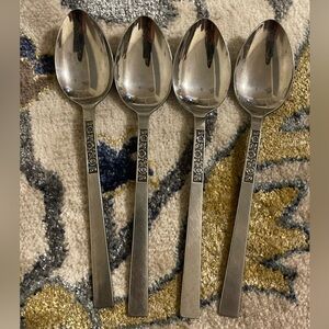 4 Stanly Roberts Stainless Japan spoonful flower
design carving